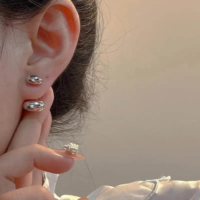 Earrings in the shape of drops, hearts and beans