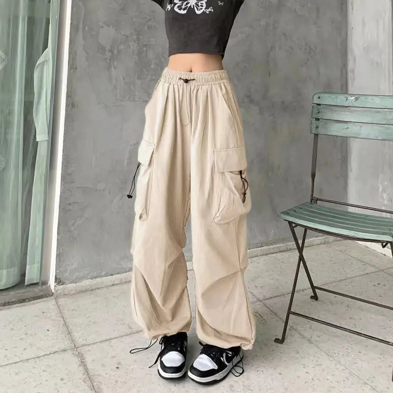 Loose wide trousers with elastic bands and pockets