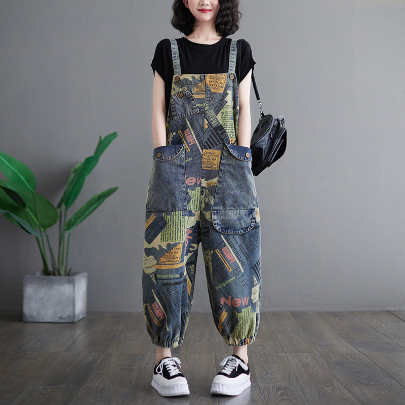 Denim trousers with suspenders and newspaper motif