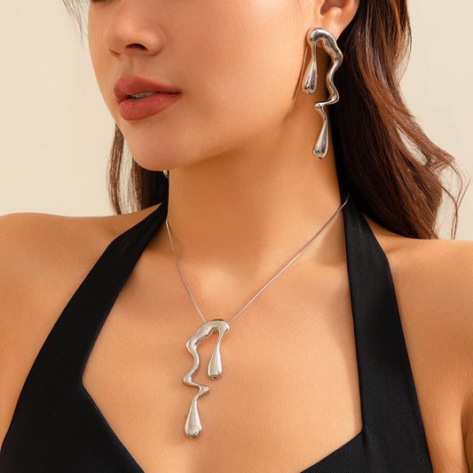 Liquid shaped earrings and necklace