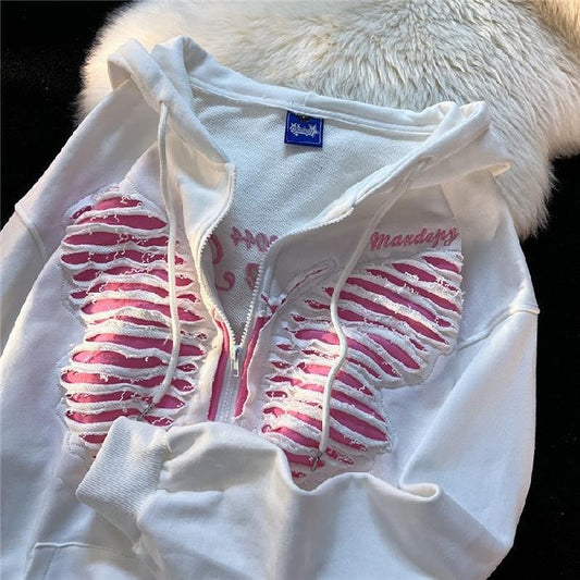 Zip-up hoodie with a butterfly sewn on