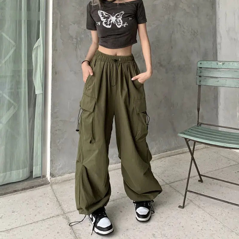 Loose wide trousers with elastic bands and pockets