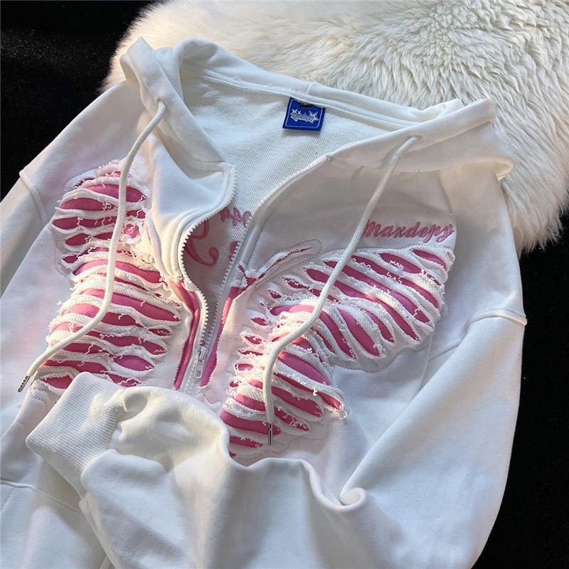 Zip-up hoodie with a butterfly sewn on