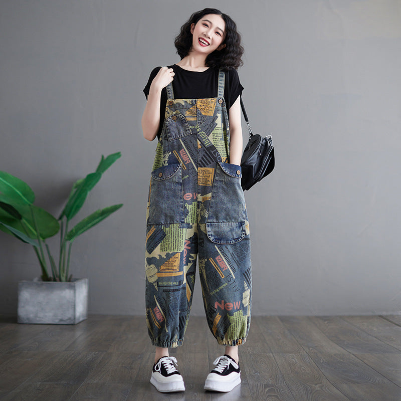 Denim trousers with suspenders and newspaper motif