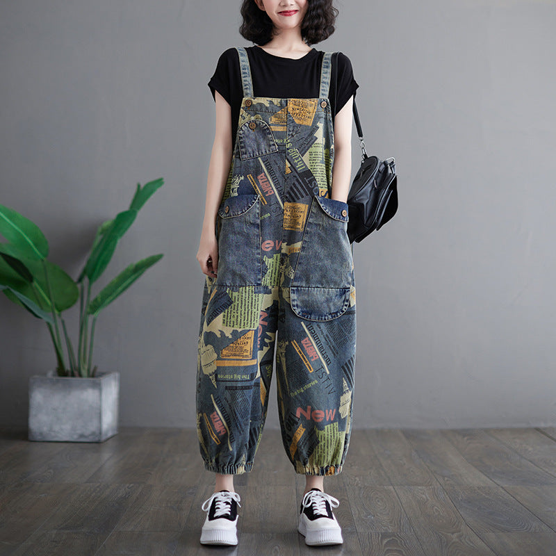 Denim trousers with suspenders and newspaper motif